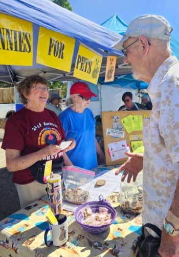 Pennies for Pets booth at Cortez Farmers Market